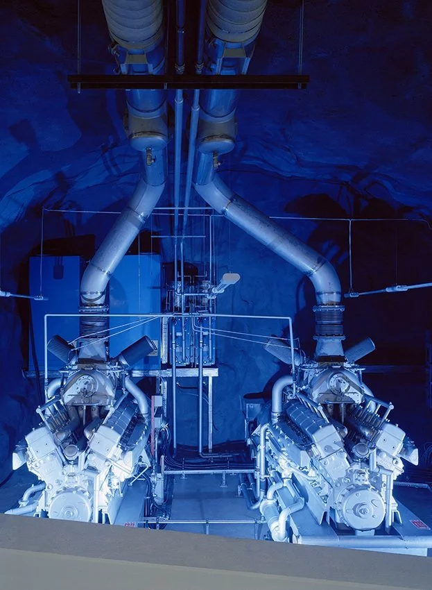 Set 30 meters underground, deep within the bedrock and in what was once used as a Swedish atomic bomb shelter, lies this high security internet center (image from AF-L)