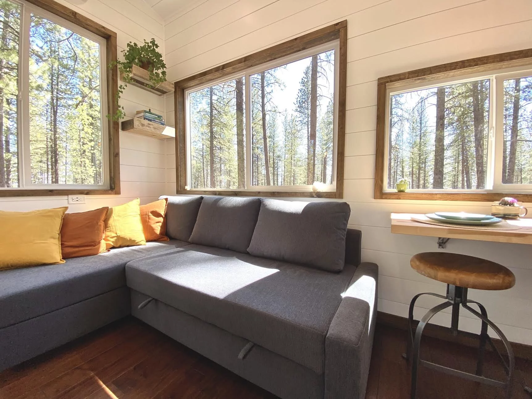 The Sonoma's living room includes a large L-shaped sofa bed