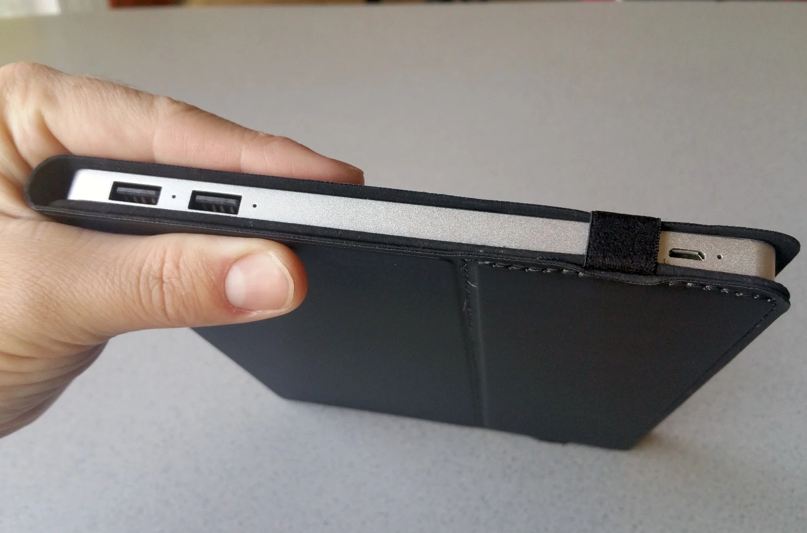 The Solartab features two USB ports that can charge out (combined) 5 V / 2.1 A