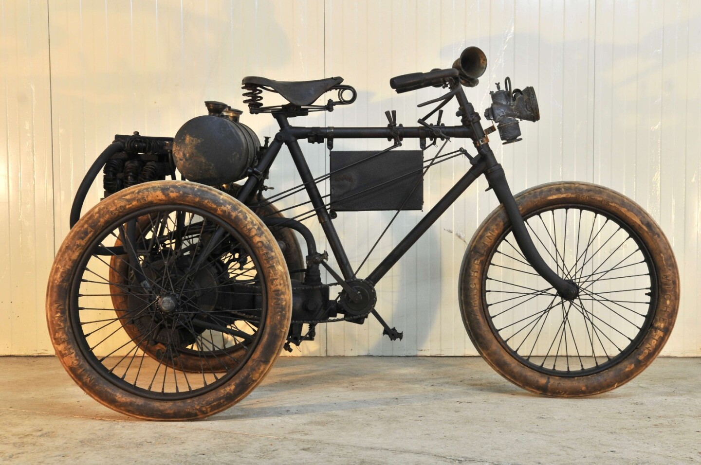 Yet another motorcycle developed by a pioneer of aviation. Indeed, Eugène Renaux was well known as a pioneer bicycle racer, pioneer motorcycle racer (winner of the 1899 Paris - St Malo race on a 500cc liquid-cooled tricycle exactly like this one, averaging 52 km/h for the 372 km race distance), pioneer car racer (winner of the 1906 Mercedes Cup, a 6,000 km stage car race across France), pioneer airplane racer, and a pioneer balloonist. This circa 1899 Renaux Tricycle sold for $167,969 ( € 137,080 )