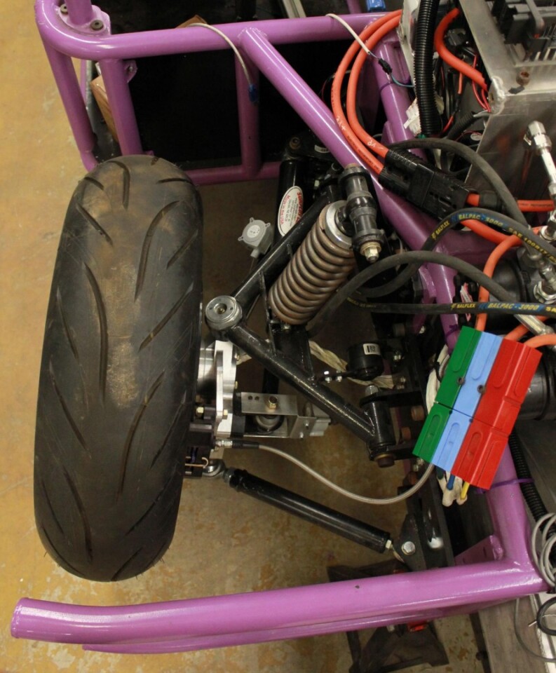 The units incorporate a dual four-bar linkage mechanism, to tilt the wheel on side-slopes