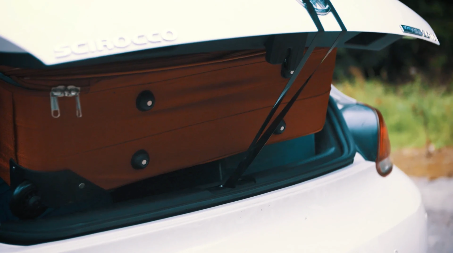 Adventure Tape keeping an overfull trunk secure