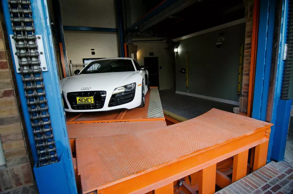 After a driver pulls into the Auto Parkit valet area, all cars are rotated on a turntable 180 degrees before storage