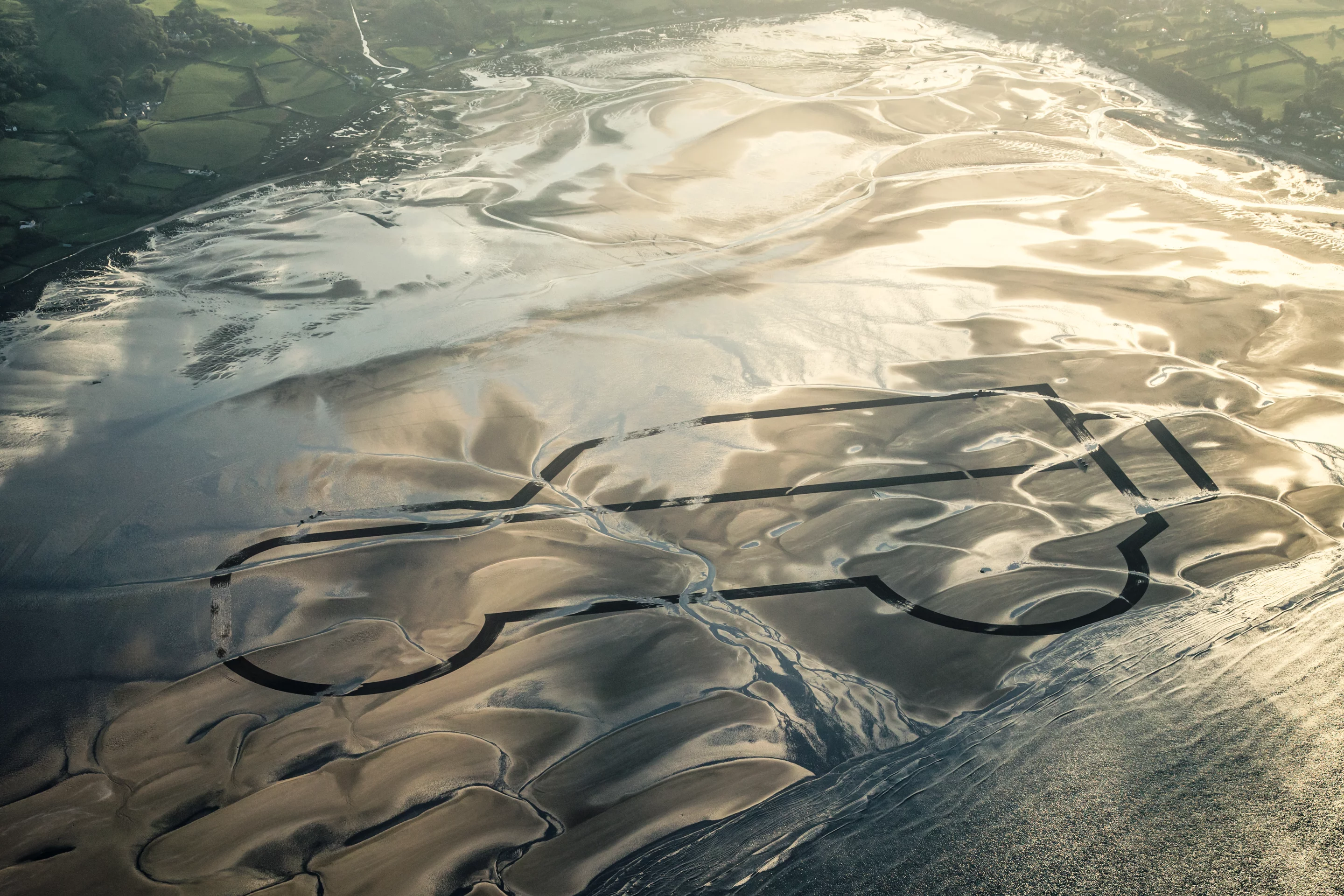 Red Wharf Bay is the site of the original Land Rover sand sketch