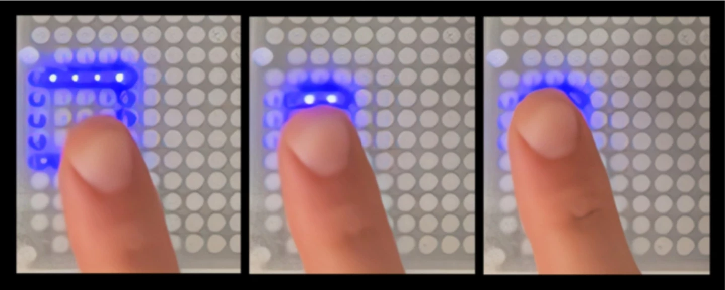 Millimeter-scale pixels lift into bumps when lit up by a focused laser pulse