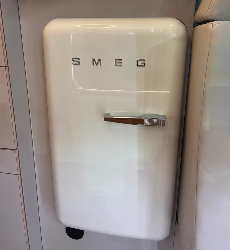 The 130-L Smeg refrigerator is the highlight of the kitchen area