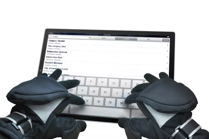ISGLOVES are mittens with ends that fold back, to expose conductive inner gloves that can be used with capacitive touchscreen devices