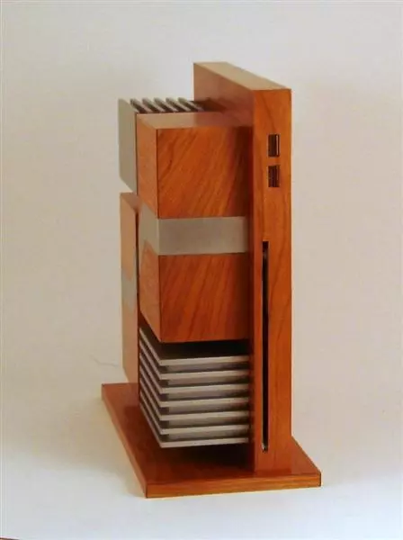 Two USB ports and the slot for the DVD burner to the front of the vertical panel