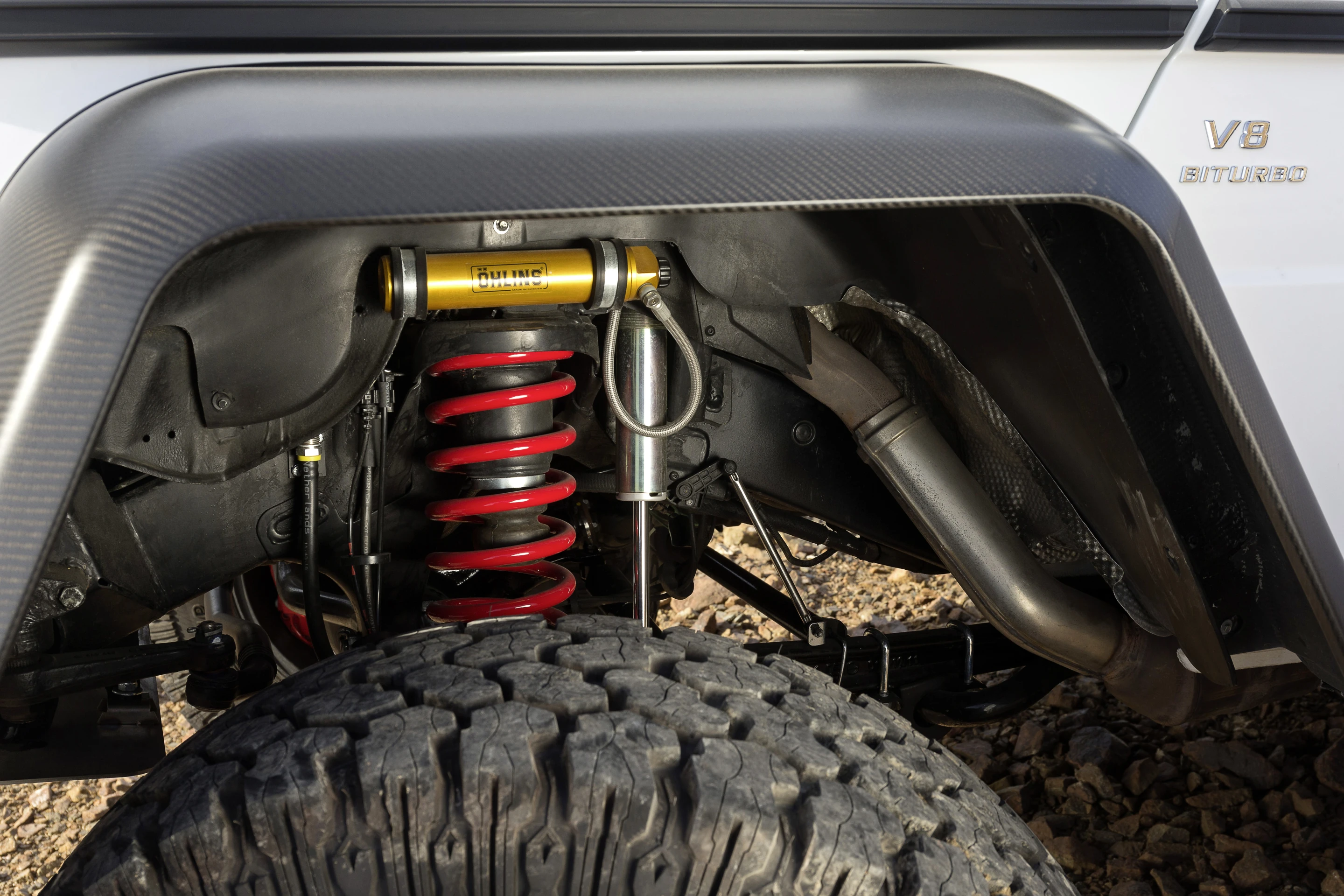 The springs are hard on the front and first rear axles and soft on the second rear axle