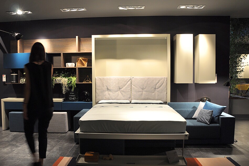 Double bed comes down from the wall above the sofa suite by Clei (Photo: Edoardo Campanale/Gizmag.com)