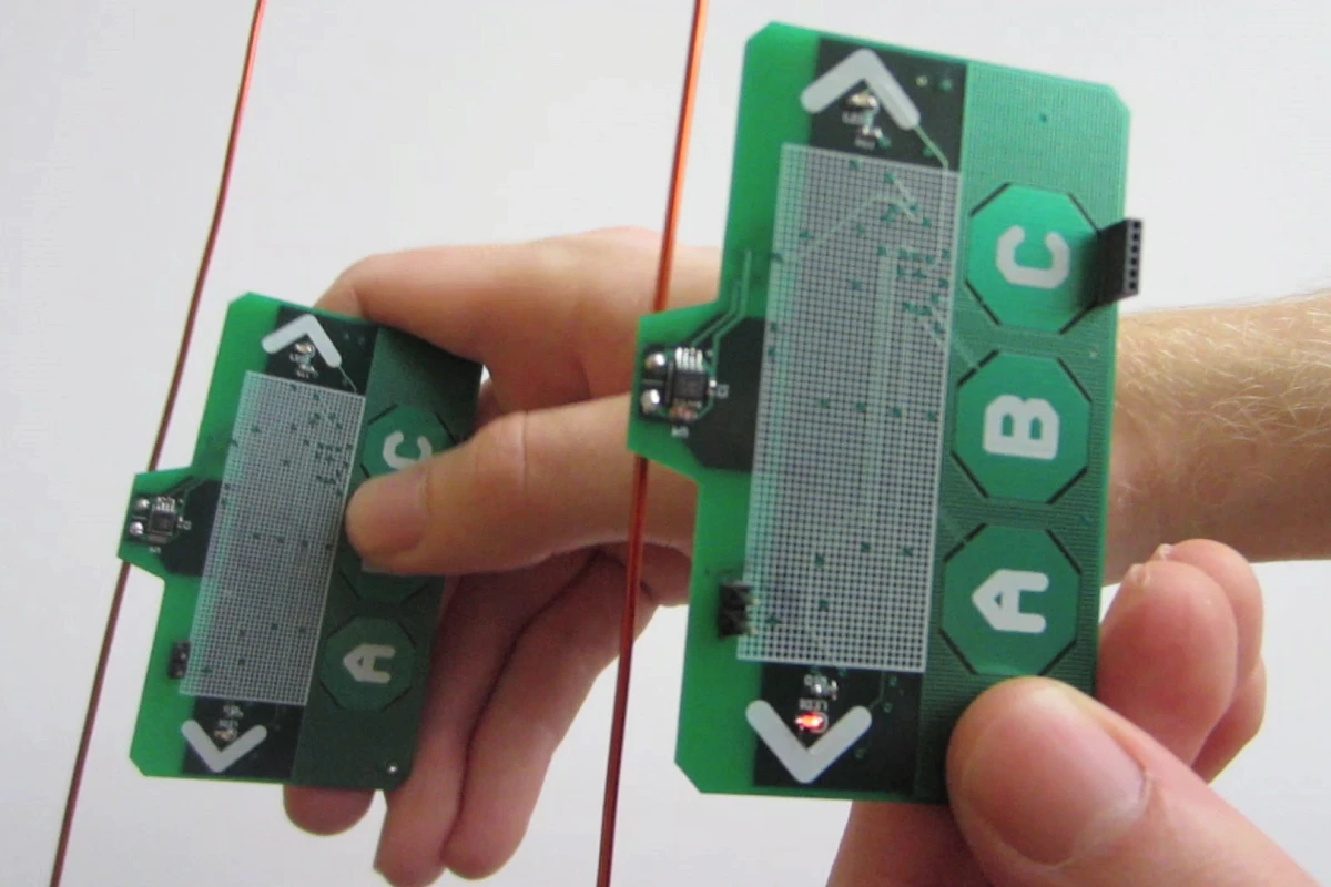 Two ambient backscatter test devices are able to communicate, despite having no batteries or power cords