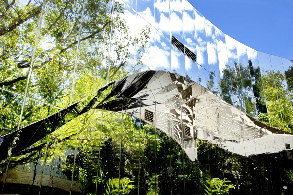 Solar reflective glass and insulated interior thermal mass throughout help reduce energy loss