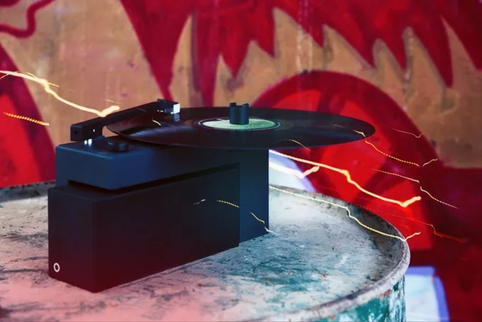 The Duo's turntable has a tonearm that ends in a quality Audio Technica MM cartridge