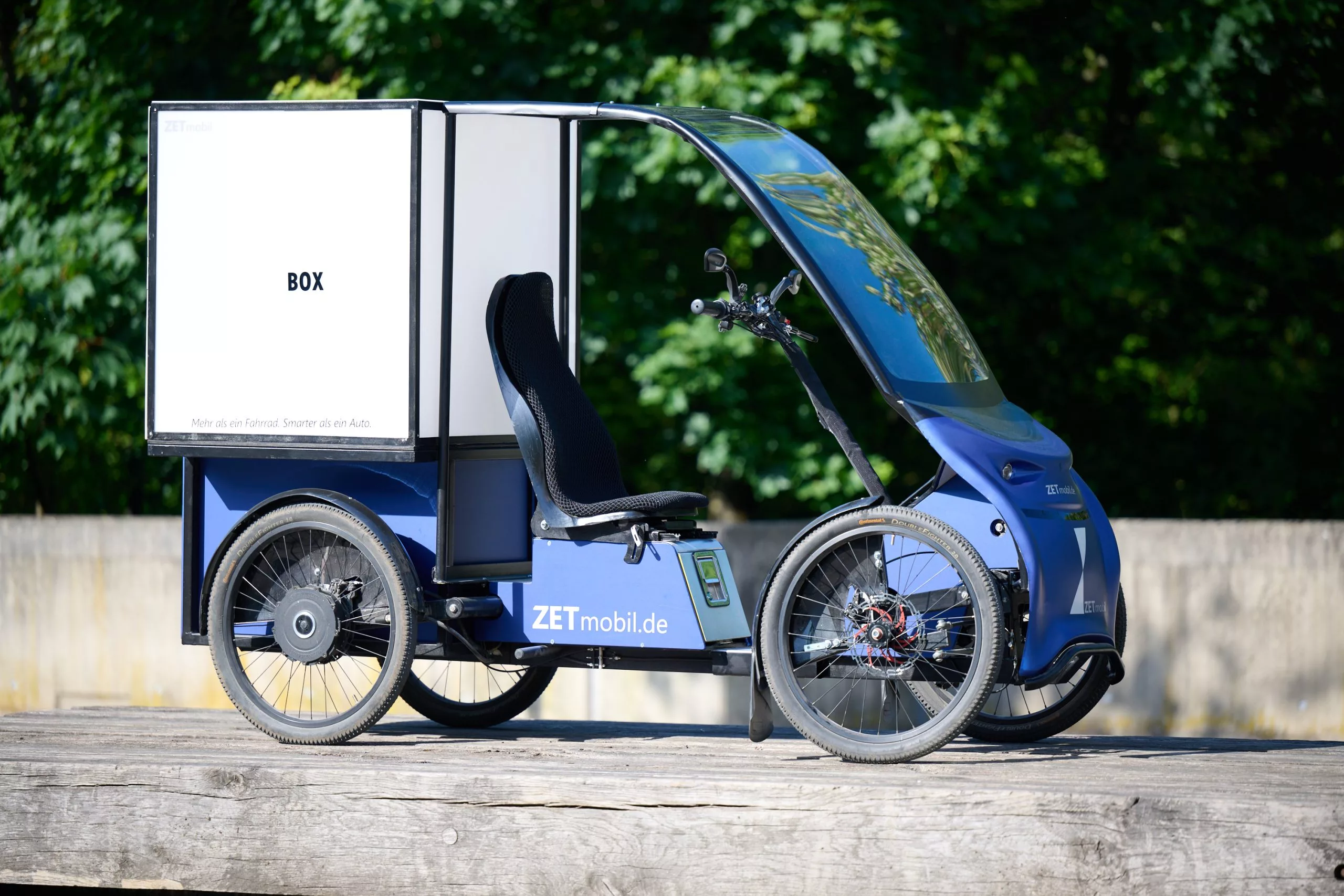 Business options include a pedal-powered delivery van with 670-liter cargo box