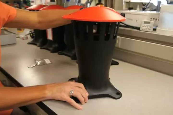 Dr. Dawn Wesson, with the traps that attract egg-carrying female mosquitoes (Image: Tulane University)