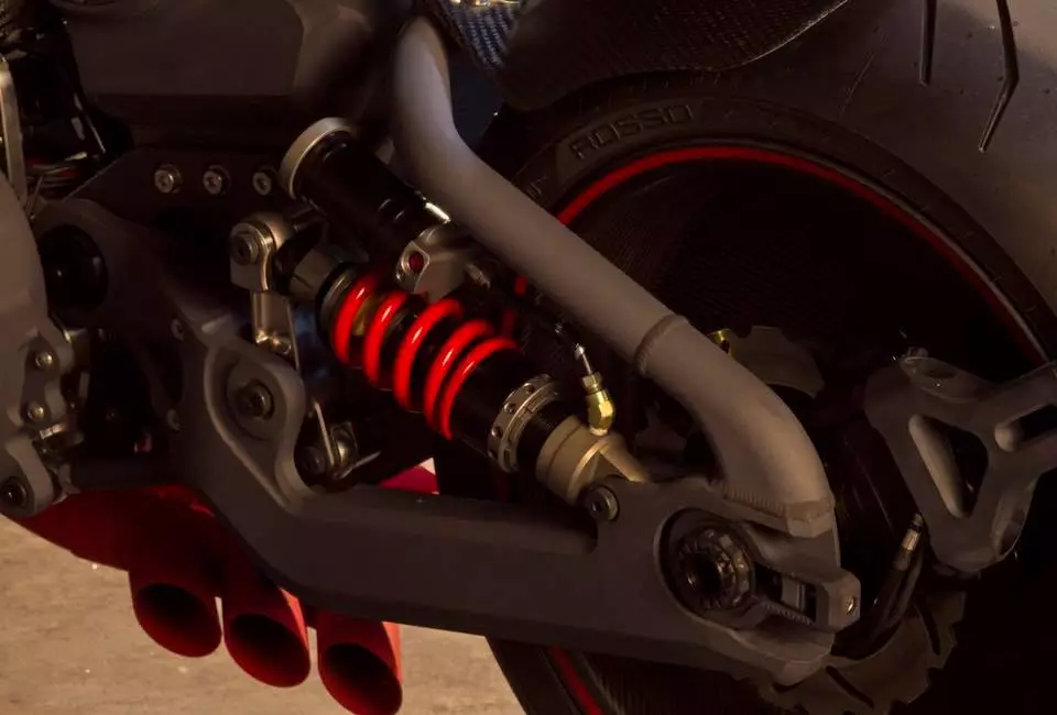 The adjustable rear monoshock of the Confederate Motors FA-13 Combat Bomber is positioned in a cantilever setup
