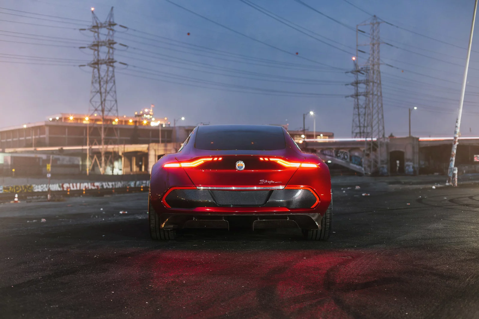 Fisker previously showed images of an EMotion with lights positioned across the entire rear, but it's split them into left and right lamps