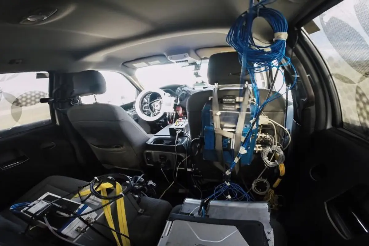The robotic driving system is designed to be added into any vehicle without requiring refitting of vehicle components