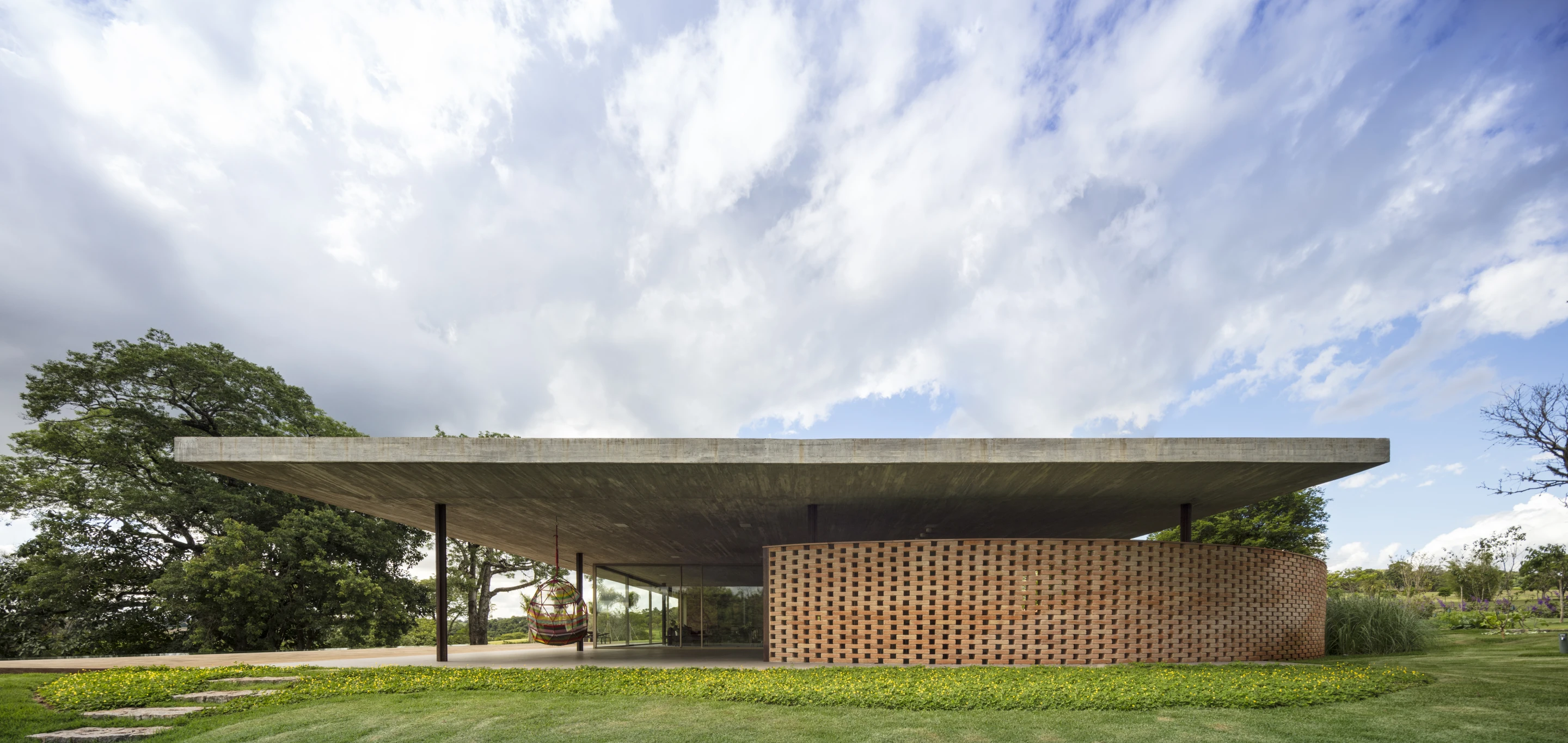Planar House's green roof features skylights to increase the amount of daylight inside the home