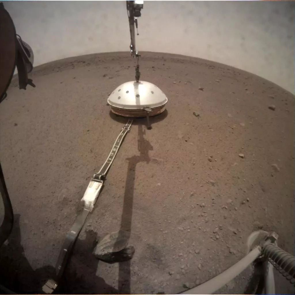 NASA's InSight lander has deployed its Wind and Thermal Shield to protect the seismometer package