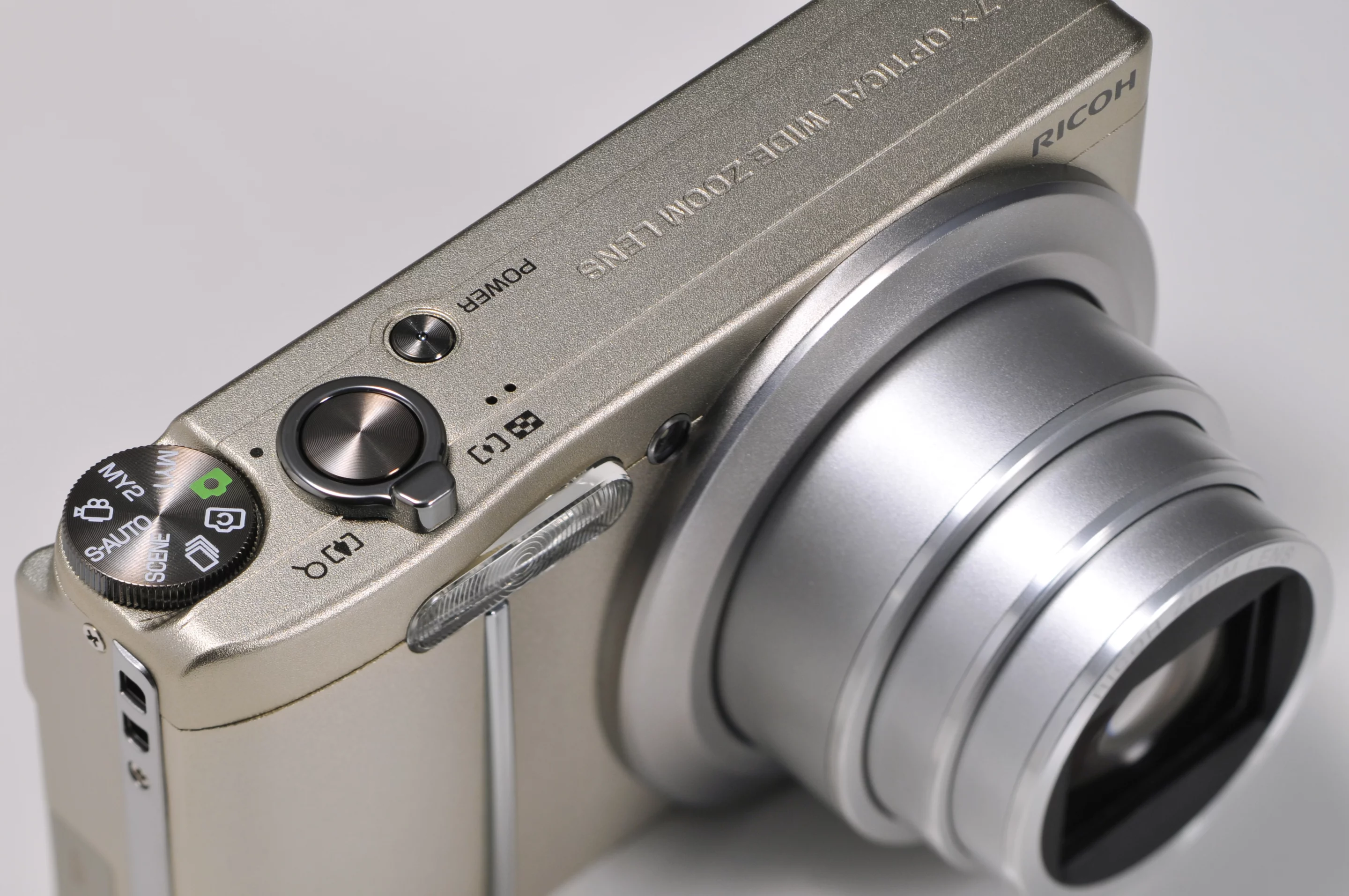 A Champagne silver CX4 from the top showing the control dial and shutter release button