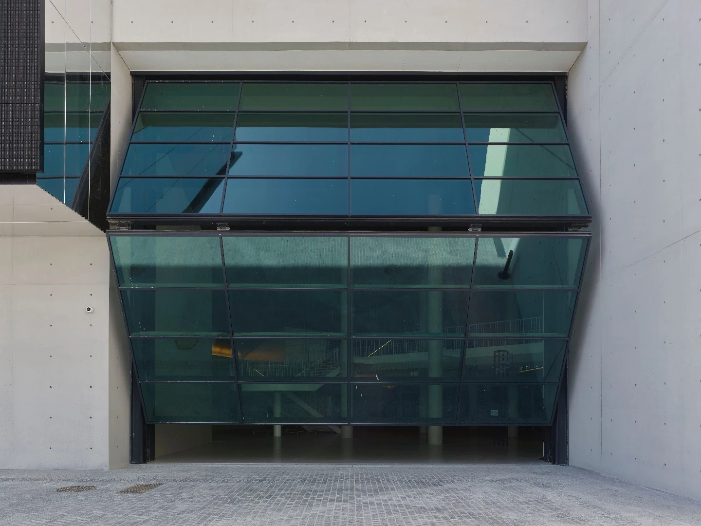 The interior La Seine Musicale's auditorium is accessed through a large glass door weighing 5 metric tons (5.5 US tons)