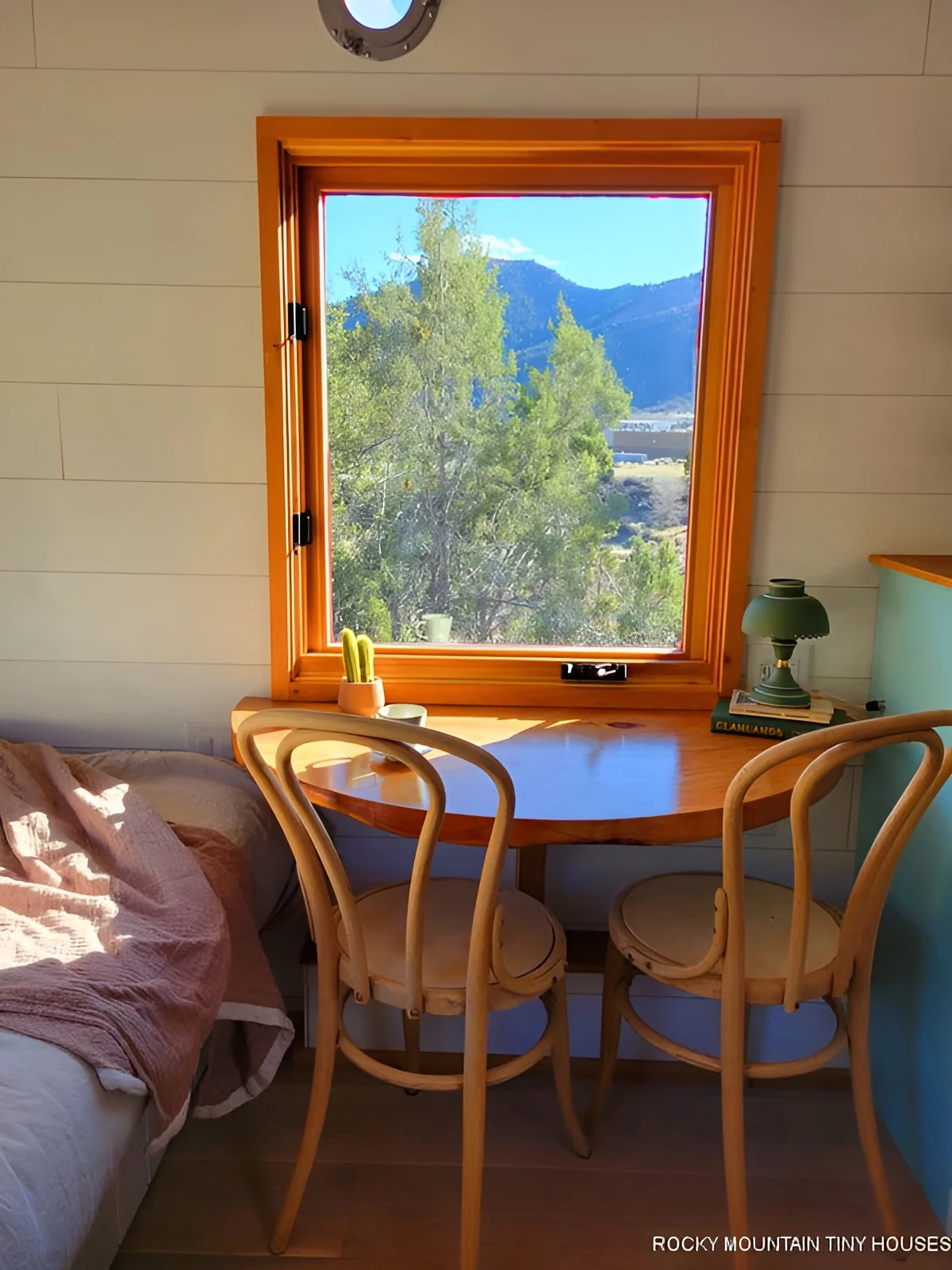 The Beatle includes a small dining table/home office area
