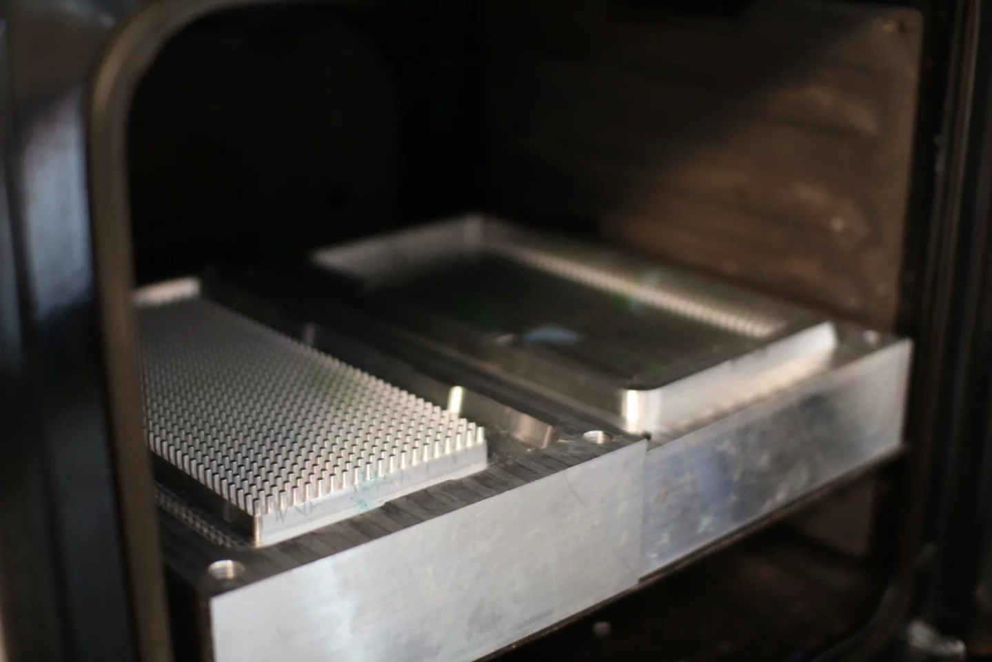 The mushed up flexible plastic waste is melted and compressed into molds to make the Gobi speaker housing modules