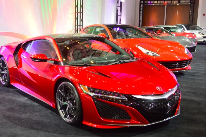 Exotics all lined up outside the Detroit media room