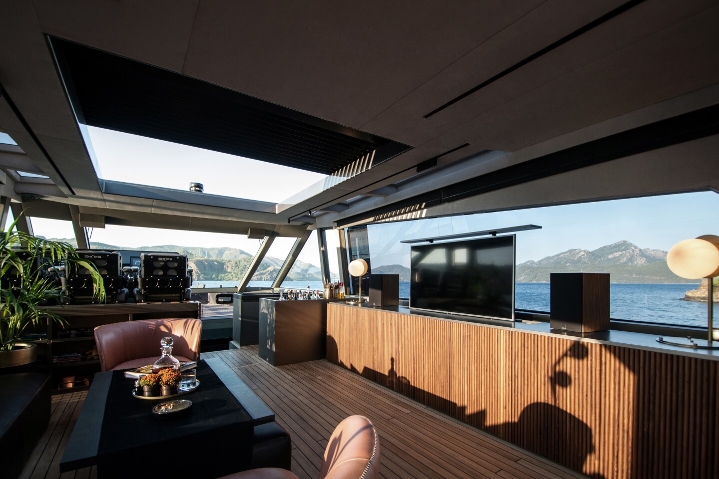 The entertainment system includes a pop-up TV and Dali audio