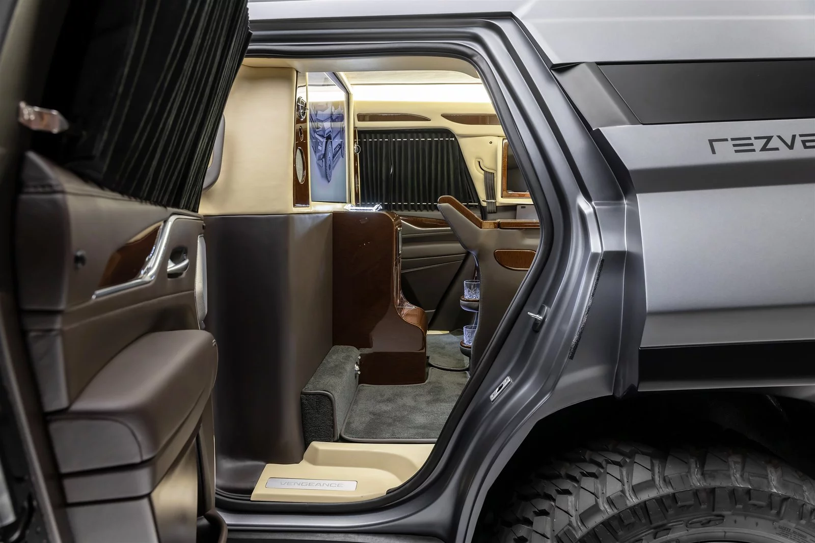 It almost looks like a portal to an alternate reality with the luxurious executive package inside this rugged, military-esque SUV