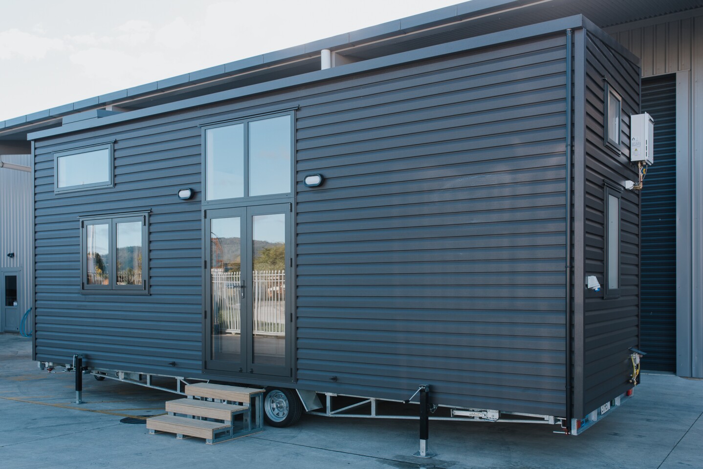 Scotty The Tiny House's weight, excluding removable items, comes in at 3,625 kg (almost 8,000 lb)