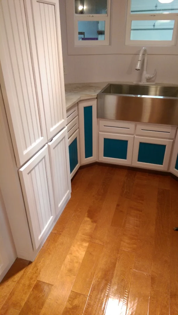 The kitchen boasts plenty of storage space