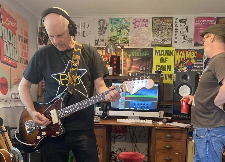 The author, left, walking the talk and recording with the Off Set