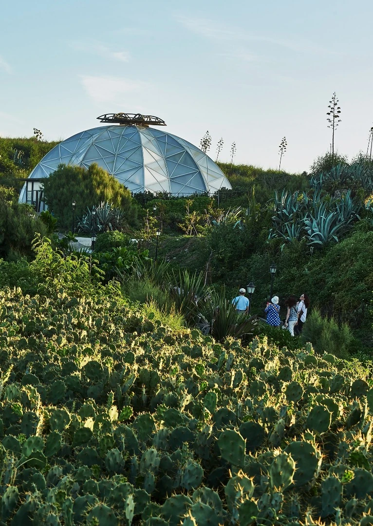 The Echinocactus grusonii cactus greenhouse, made of bended steel covered in white and transparent panels, at the Penghu Qingwan Cactus Park