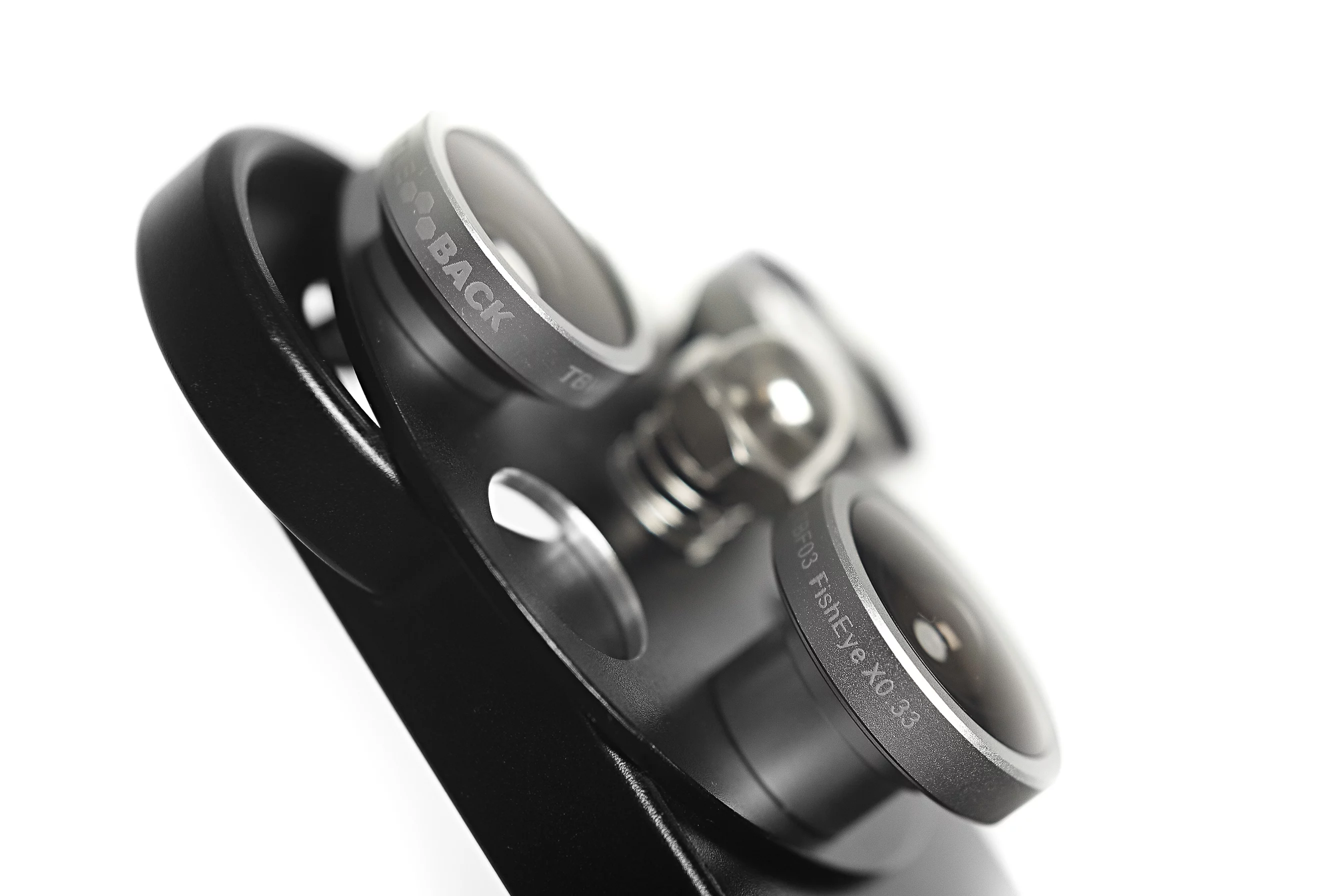 The iPhone Lens Dial features wide angle, fisheye and telephoto lenses, which swivel into place over top of the existing camera's lens