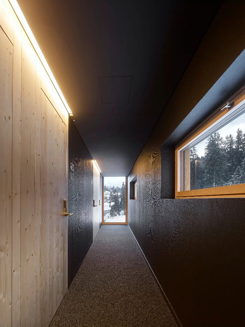 Hallway inside Switzerland's prefab Revier Mountain Lodge