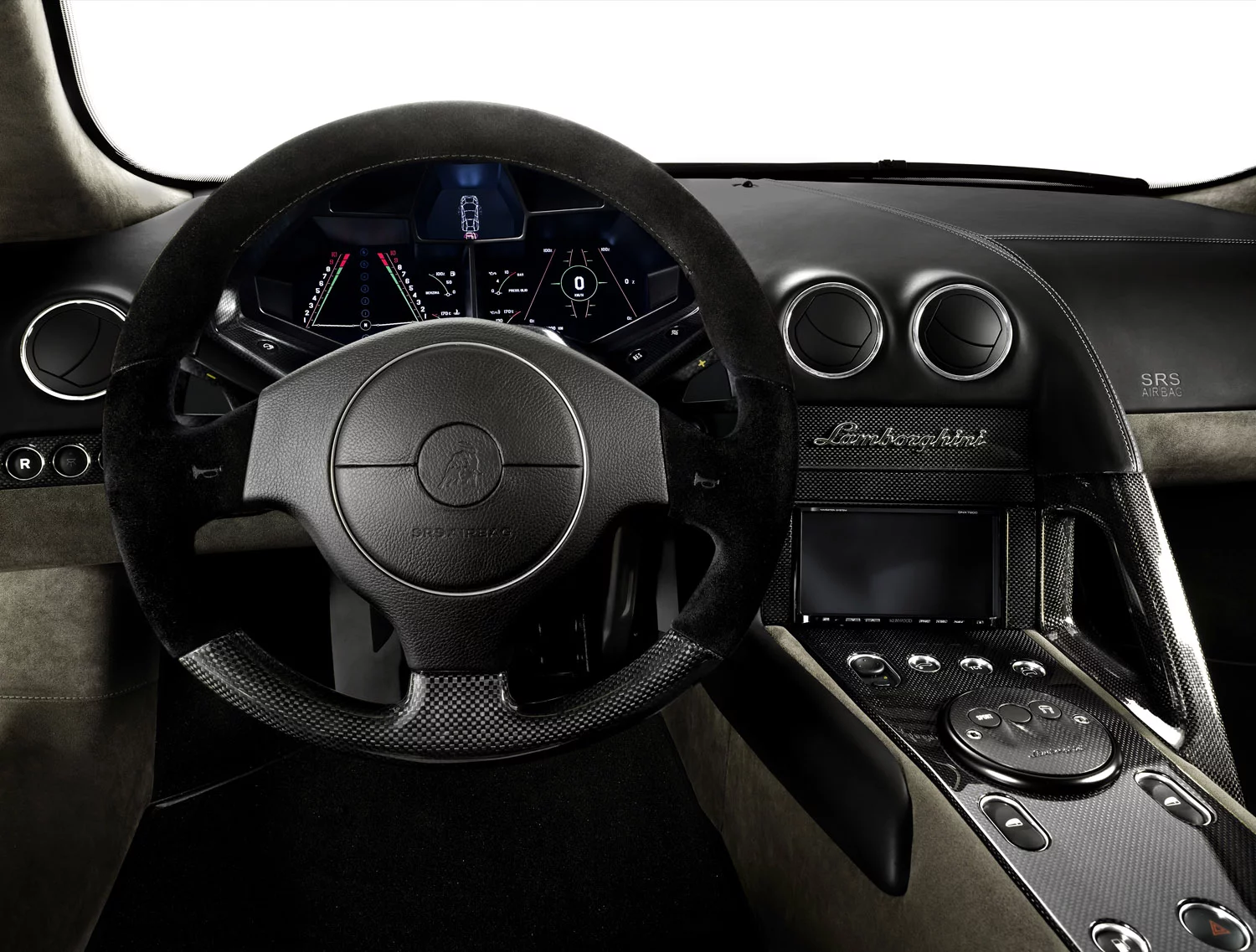 Reventon, with gauge work more fighter-jet than supercar, featured Alcantara, carbon fiber, aluminium and leather amenities