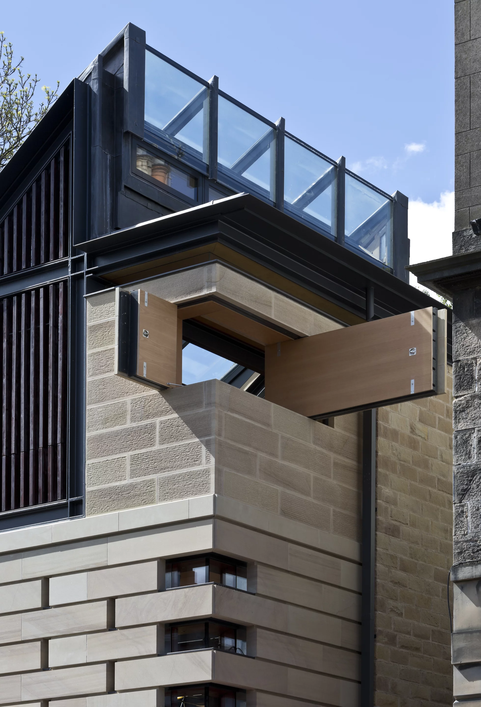 Richard Murphy installed novel design touches like pulleys and levers which move sections of wall to open up the home to the sun