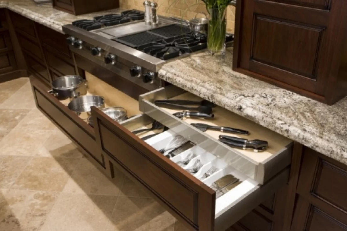Drawers that open remotely or with the brush of a hand