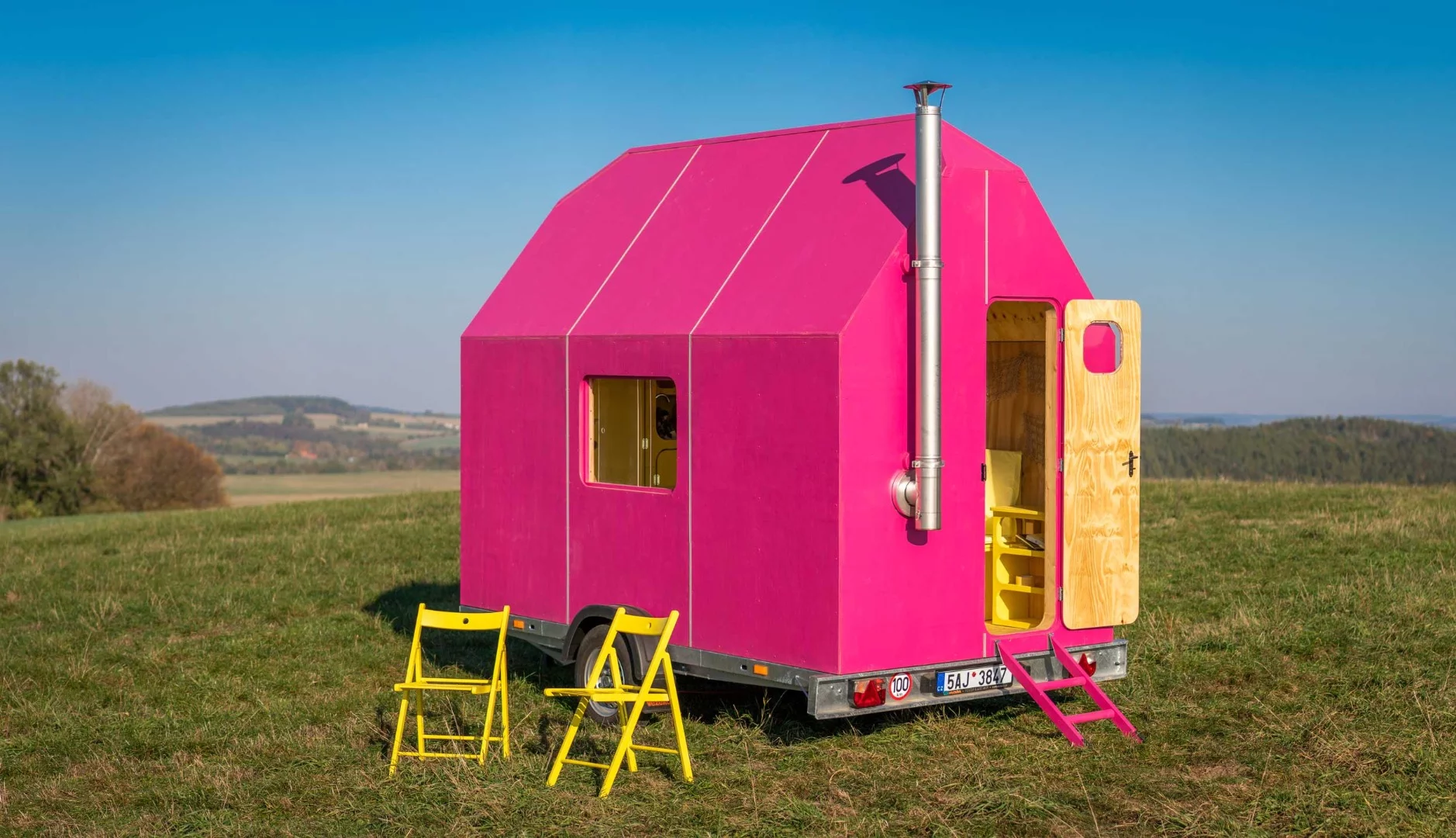 Pin-Up Houses told us that the materials for the Magenta shown cost $2,100, with the labor costing around $7,900