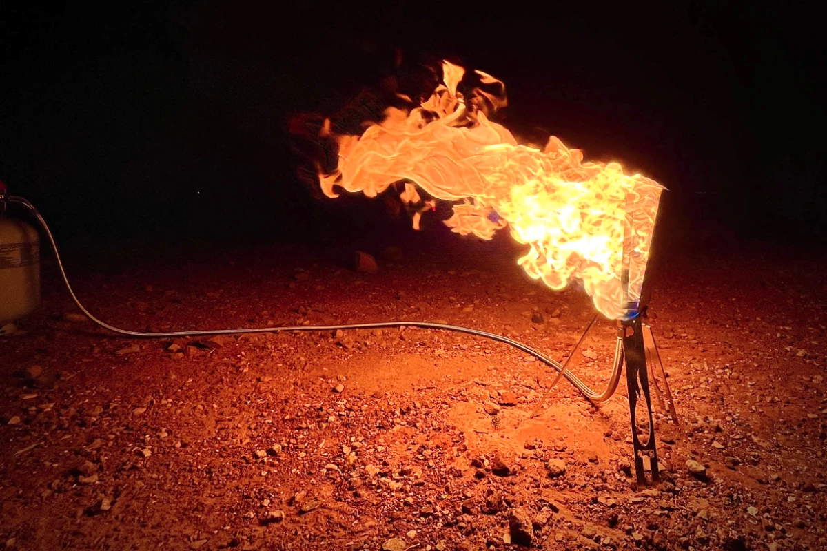 Flip the Tripod Torch dial and enjoy a veritable bonfire