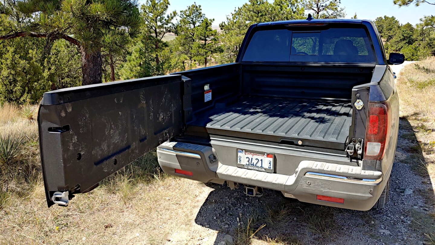 One of the Ridgeline's greatest features is the outward-swinging tailgate for easier bed access