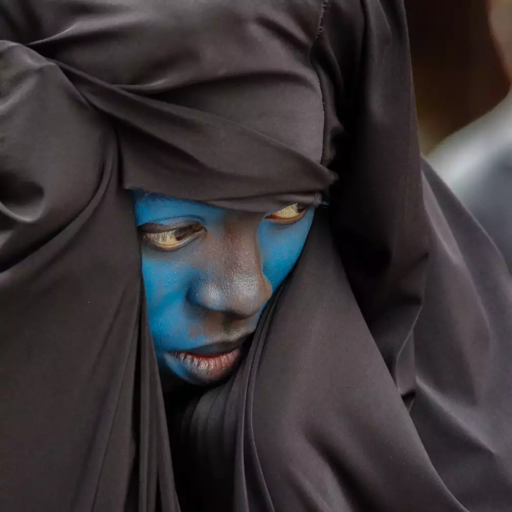 Winner of the Photobox Instagram Photography Awards in the Travel category, capturing a punter at the Zinneke Parade by @gilles.guilbert.photographies