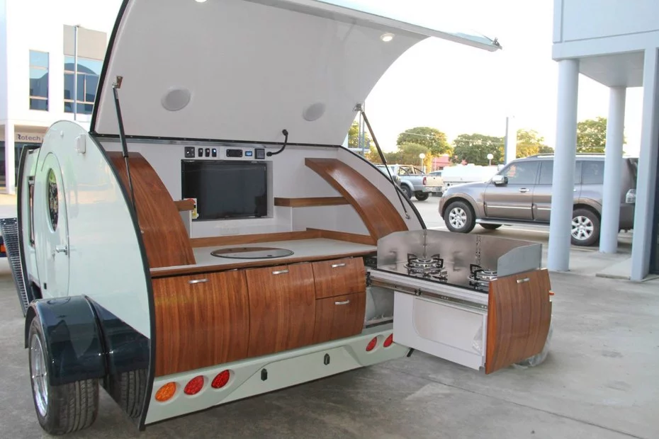 Gidget offers a rotating indoor/outdoor entertainment center in the galley