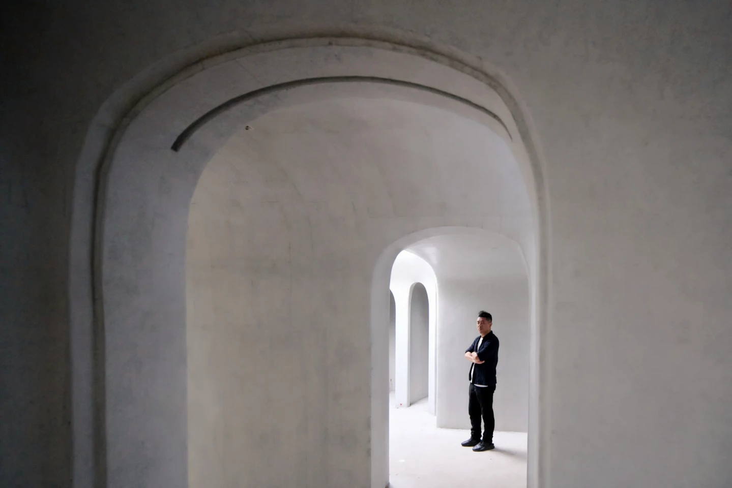 The Wormhole Library's curved concrete walls are being cast using both a CNC router and a 3D printer