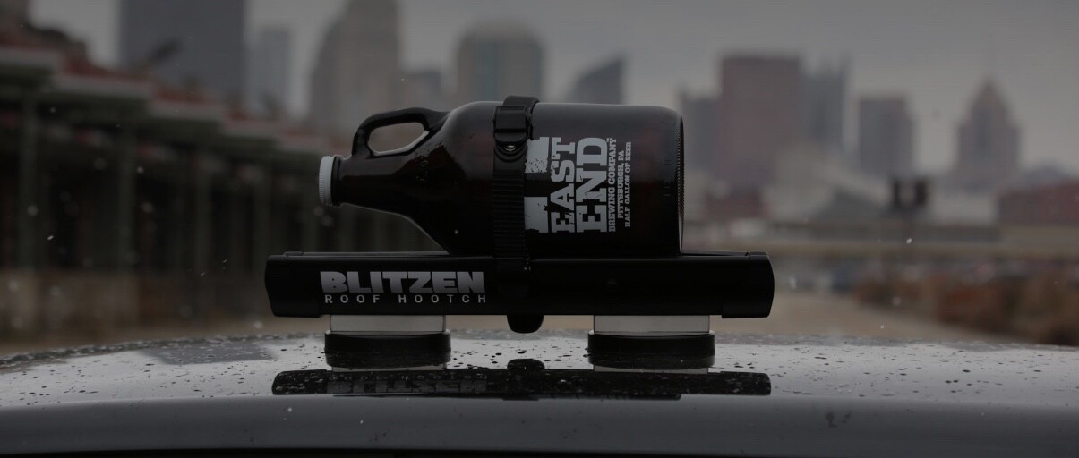 Blitzen cradles bottles of any size in an aluminum rail, holding them down using a ratcheting rubber strap
