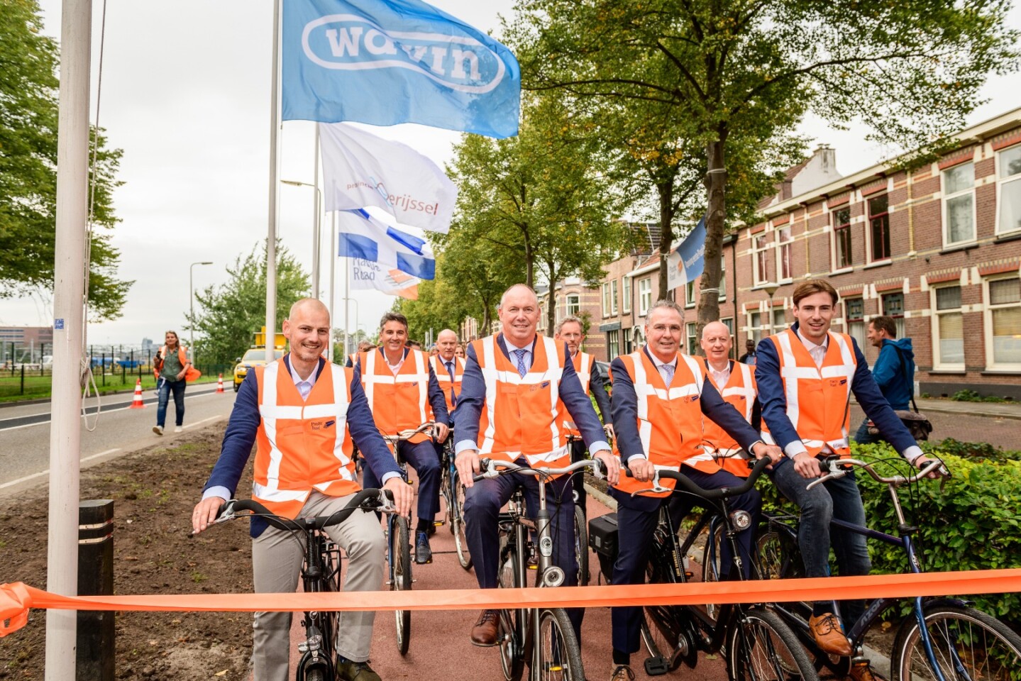 Representatives of PlasticRoad partners get ready to test the new bike path
