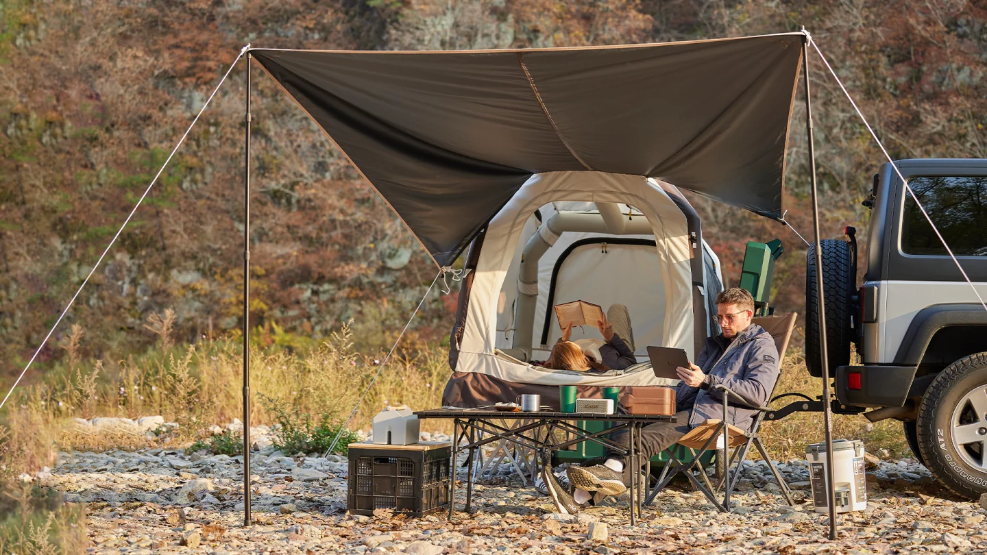 The awning does not come with the base-level "Hitch Home Light" pack but does come with more expensive packages