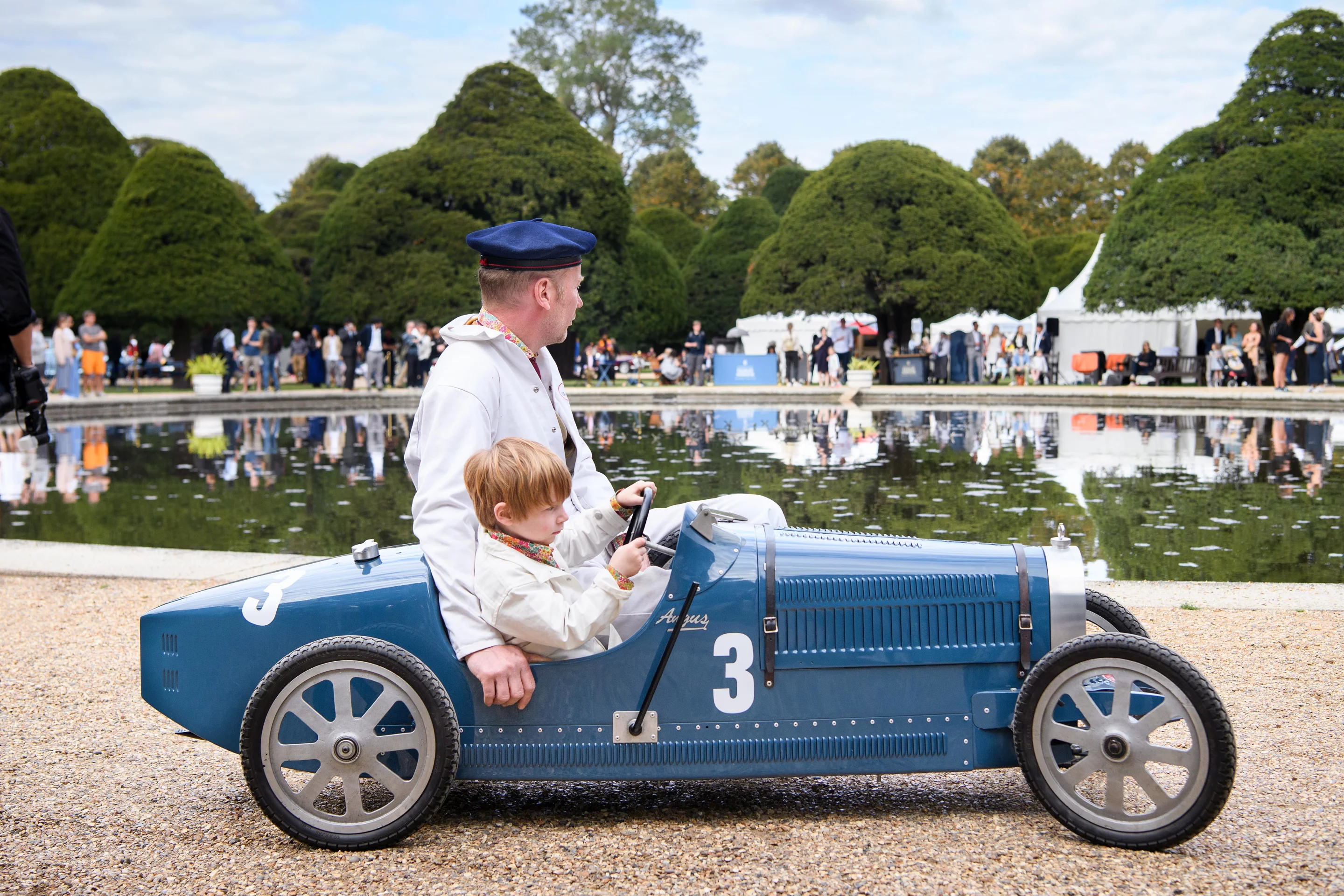We don't know anything about this car other than the driver's name: Angus. I think we can safely say the car is perfectly and lovingly maintained and that we have a devoted dad and a delighted son. Wonderful image from Tim Scott.